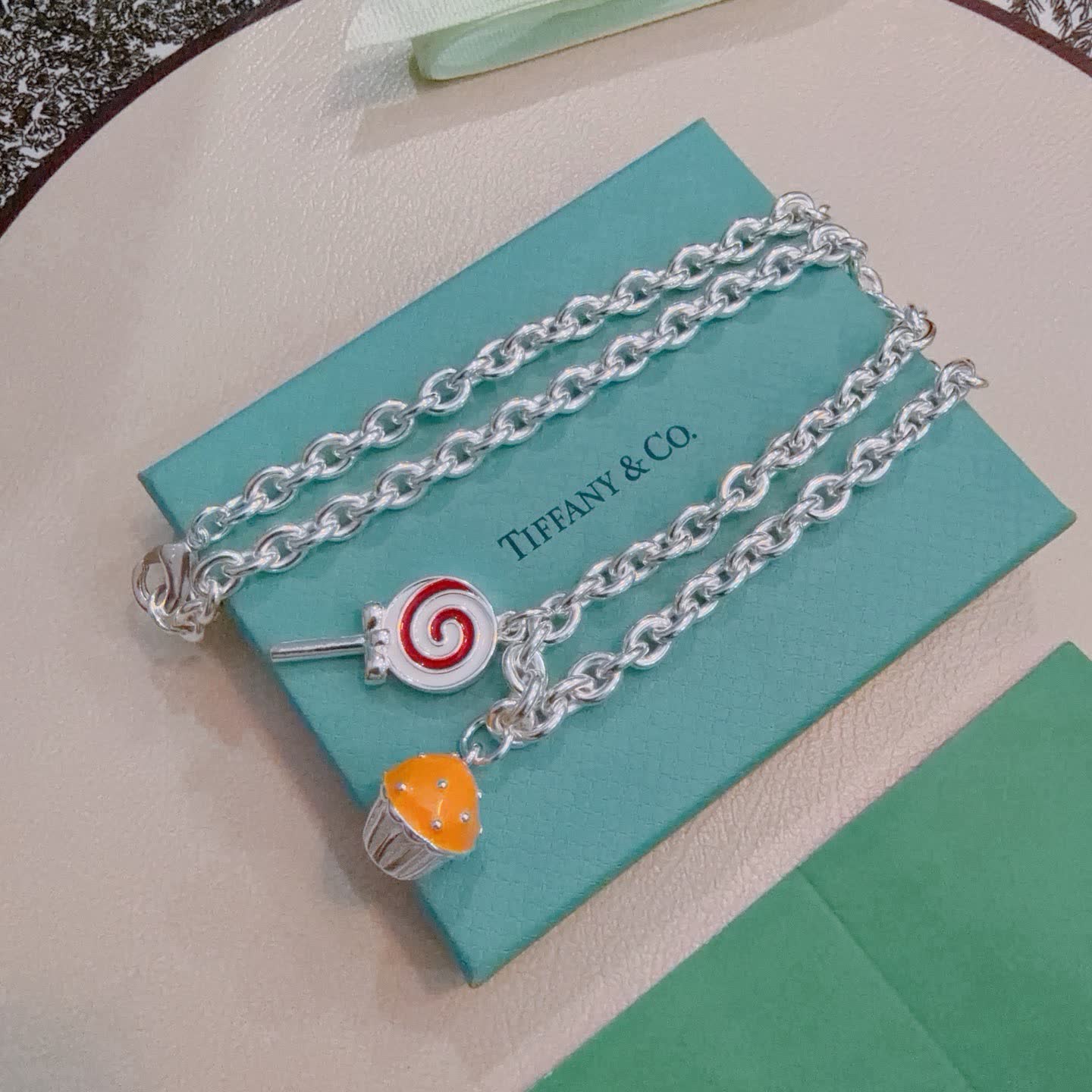 Tiffany & Co. Silver Charm Necklace with Lollipop and Cupcake Charms